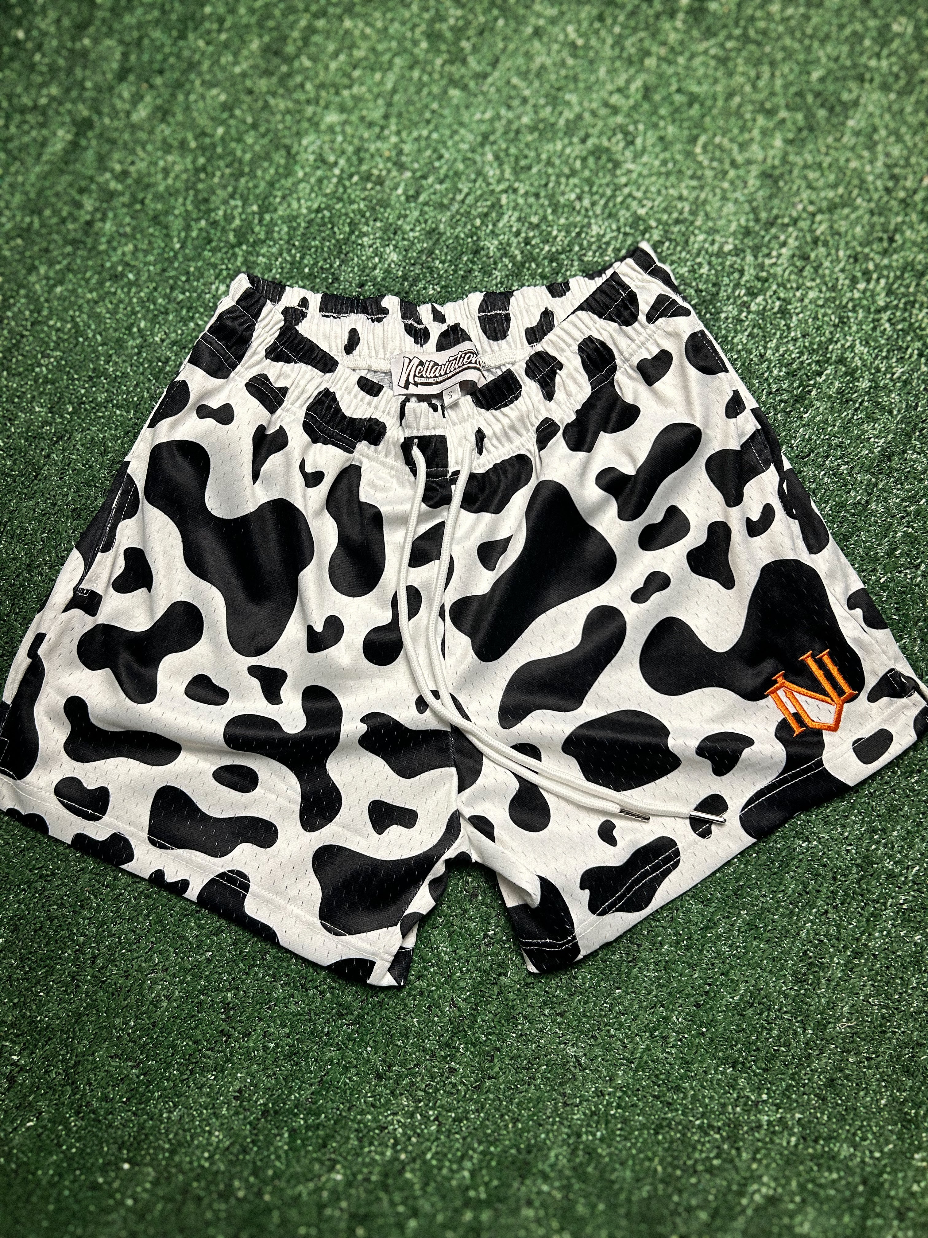 Black Cow Print Mesh Shorts