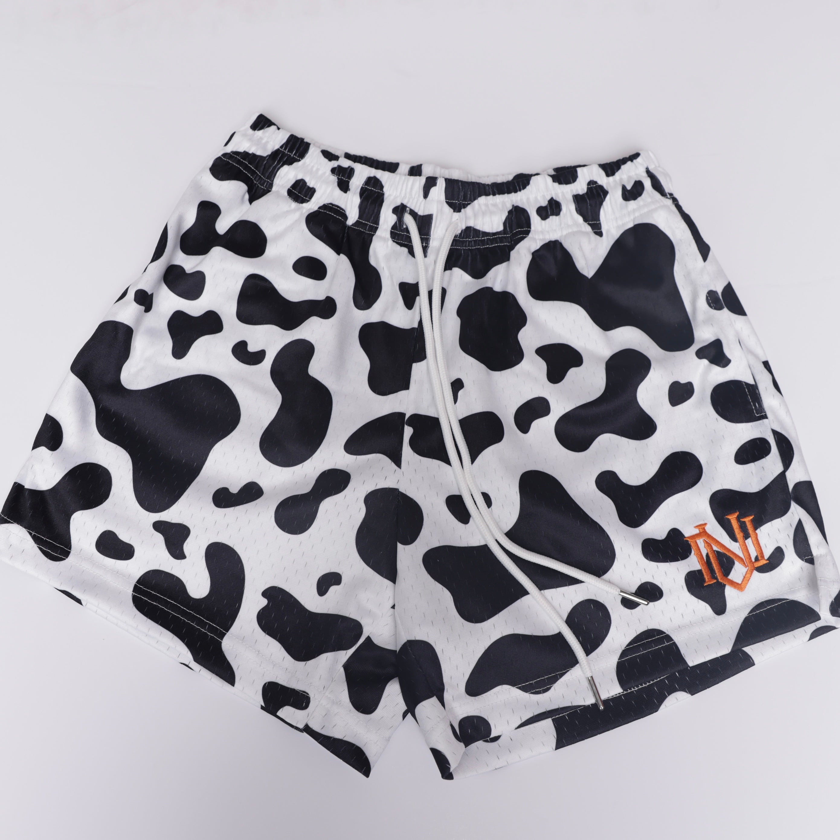 Black Cow Print Mesh Shorts