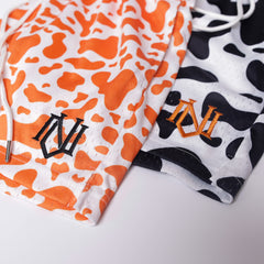 Orange Cow Print Mesh Shorts