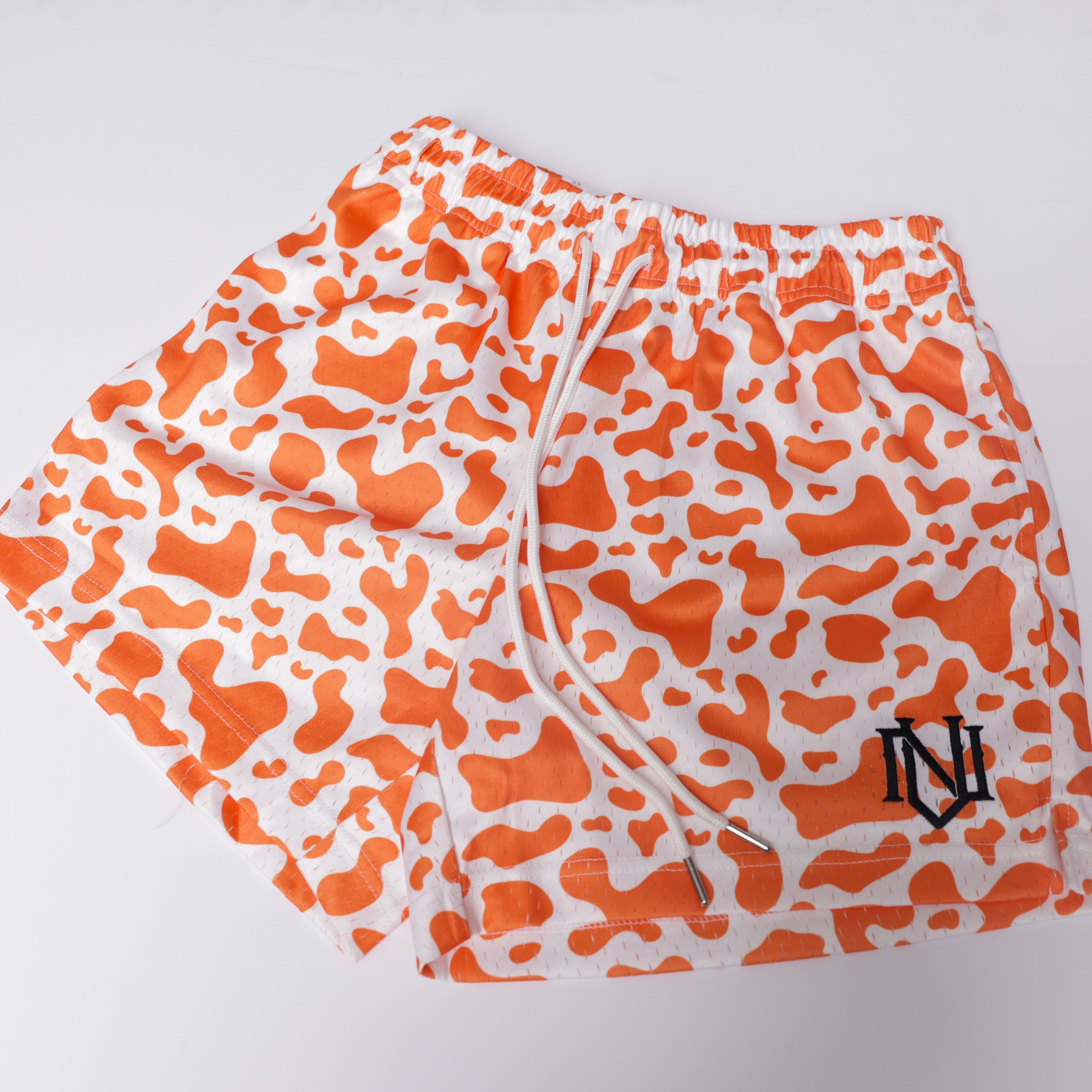 Orange Cow Print Mesh Shorts