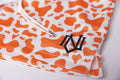 Orange Cow Print Mesh Shorts