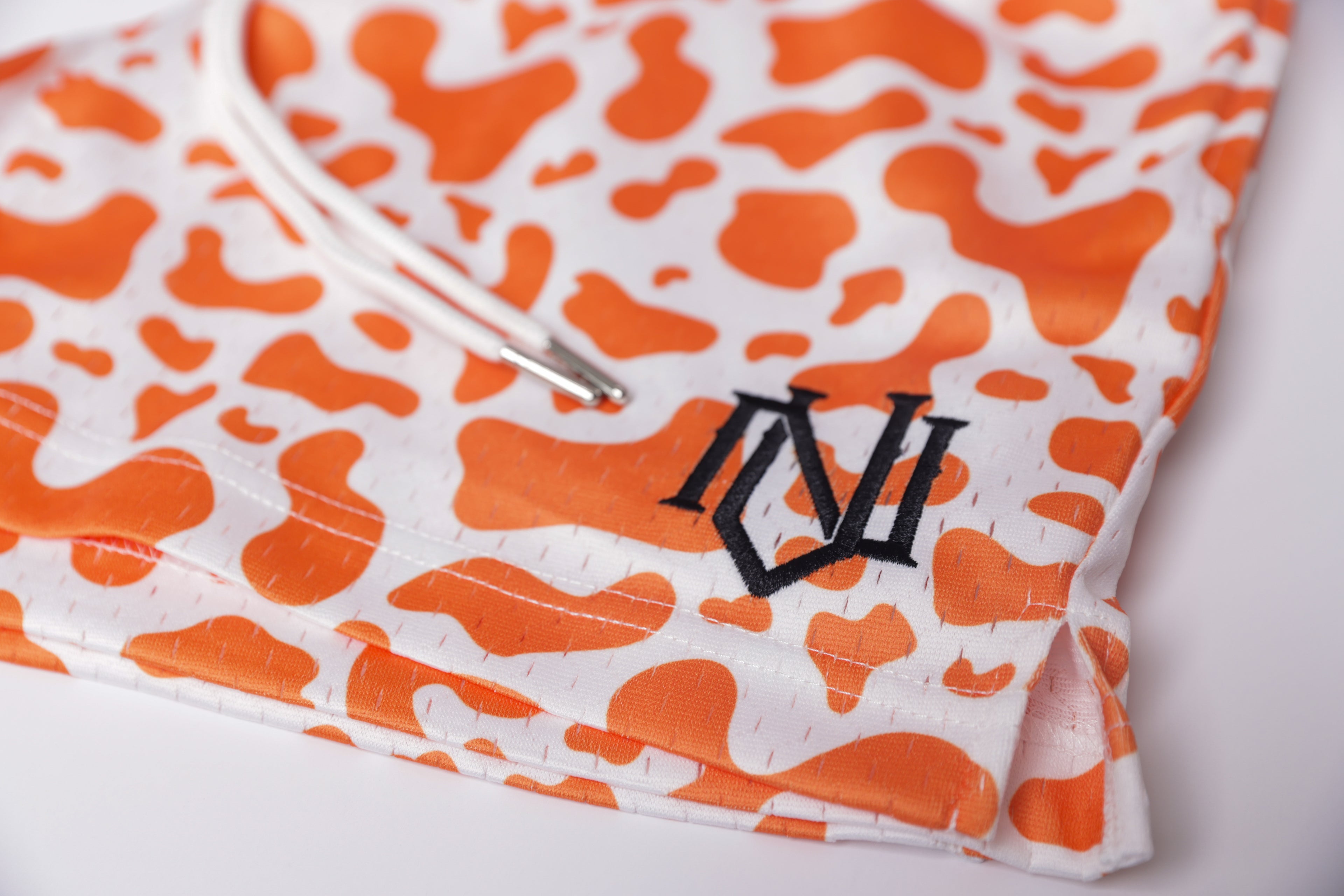 Orange Cow Print Mesh Shorts