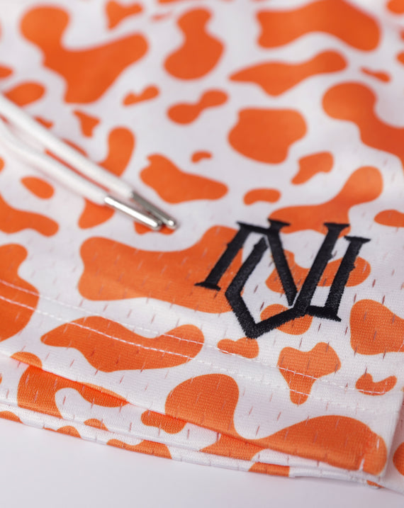 Orange Cow Print Mesh Shorts